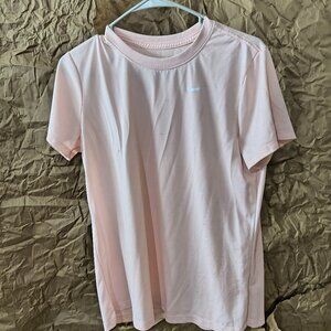 Women's baby pink Nike shirt